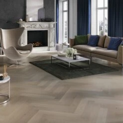 Liberty Floors Grey Mist Oak - Manor Herringbone Parquet 14mm Engineered Real Wood Flooring (249870) -Laminate Flooring Sales Store grey mist oak manor herringbone parquet 14mm engineered real wood flooring 249870 p108537 235981 image