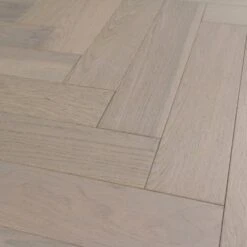 Liberty Floors Pebble Grey Oak - Herringbone Parquet 14mm Engineered Real Wood Flooring (219386) -Laminate Flooring Sales Store pebble grey oak herringbone parquet 14mm engineered real wood flooring 219386 p85834 201394 image